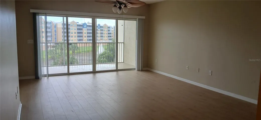 Living room and dining room combo.  Very clean