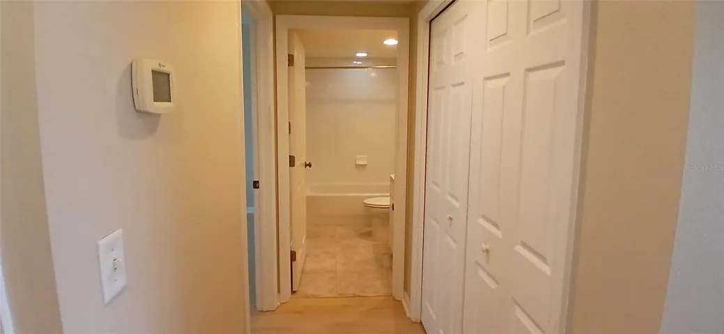Hallway leading to guest bedroom and bath