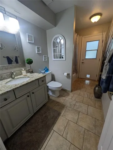 Guest Bathroom with patio access