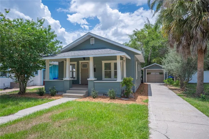 Front of house with detached garage