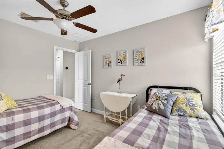 Upstairs bedroom complete with blinds and ceiling fan