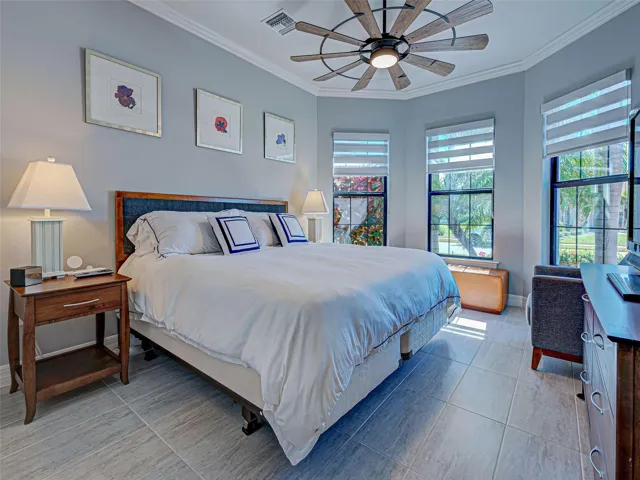 Guest bedroom featuring turret windows