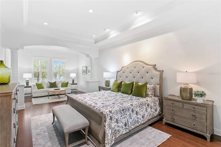 A rare first-floor primary suite provides a private sanctuary