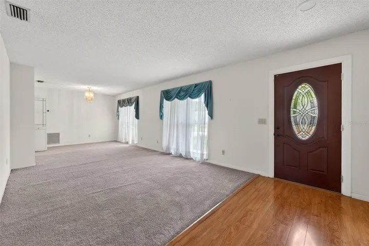 Front Entryway to Living Room/Dining Room-Brand New Carpet