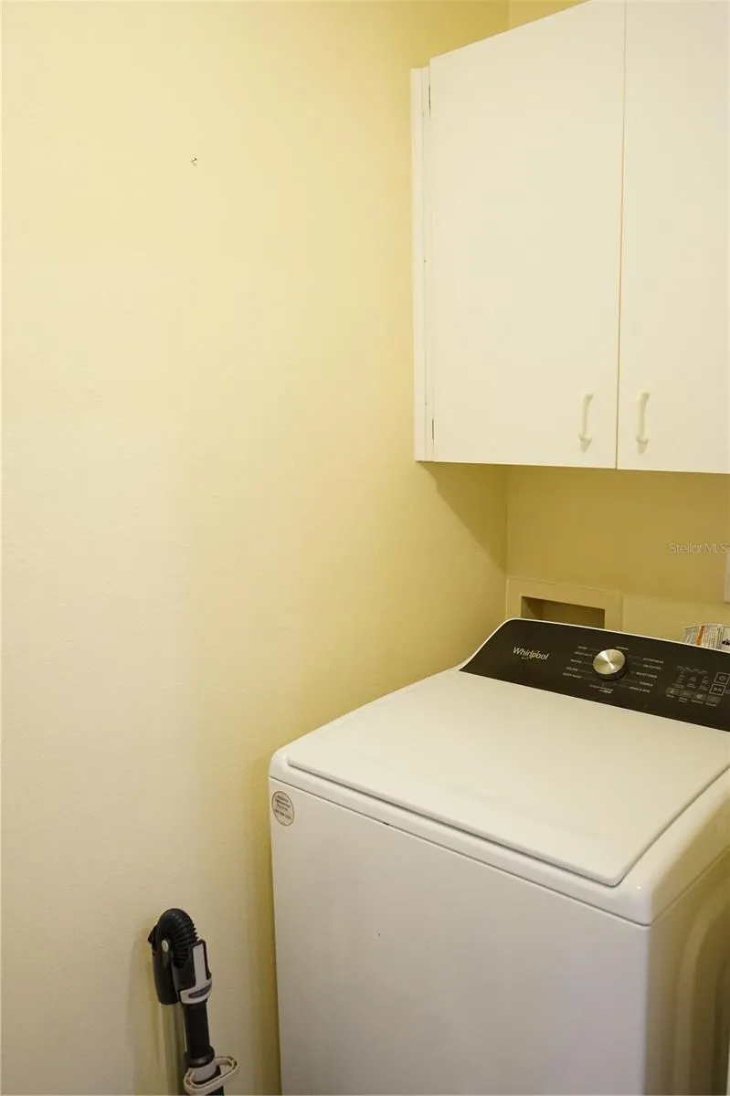 storage cabinet above washer