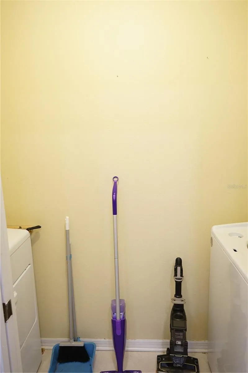 laundry closet is next to kitchen