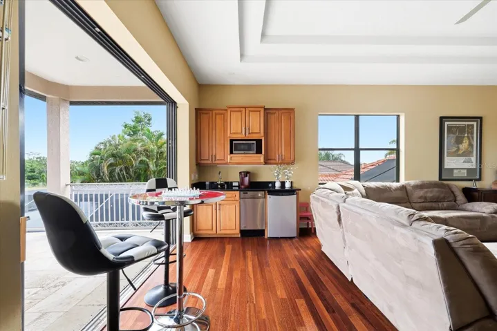 Loft space opening up to an extra large balcony