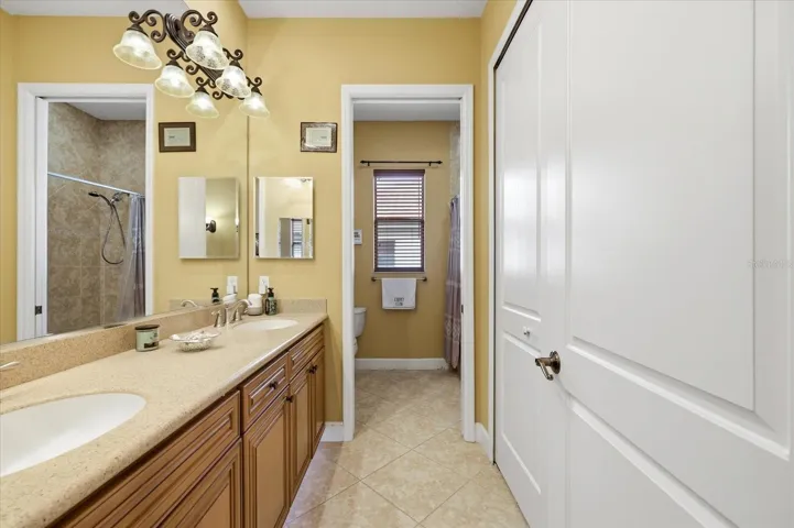 Ground floor Guest bathroom with large storage/linen closet