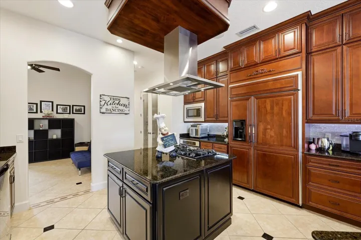 Spacious kitchen with middle island and huge walk in pantry