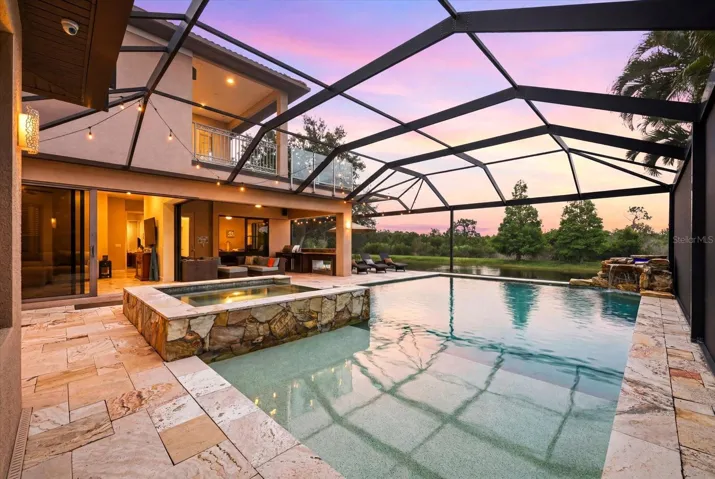 Extra large pool area with oversized pool and spa