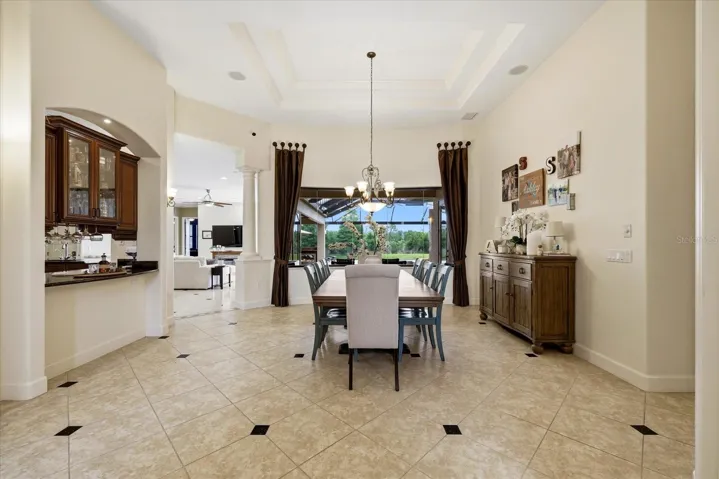 View from the front door as you walk into the home. The great room is currently used as a dining room.