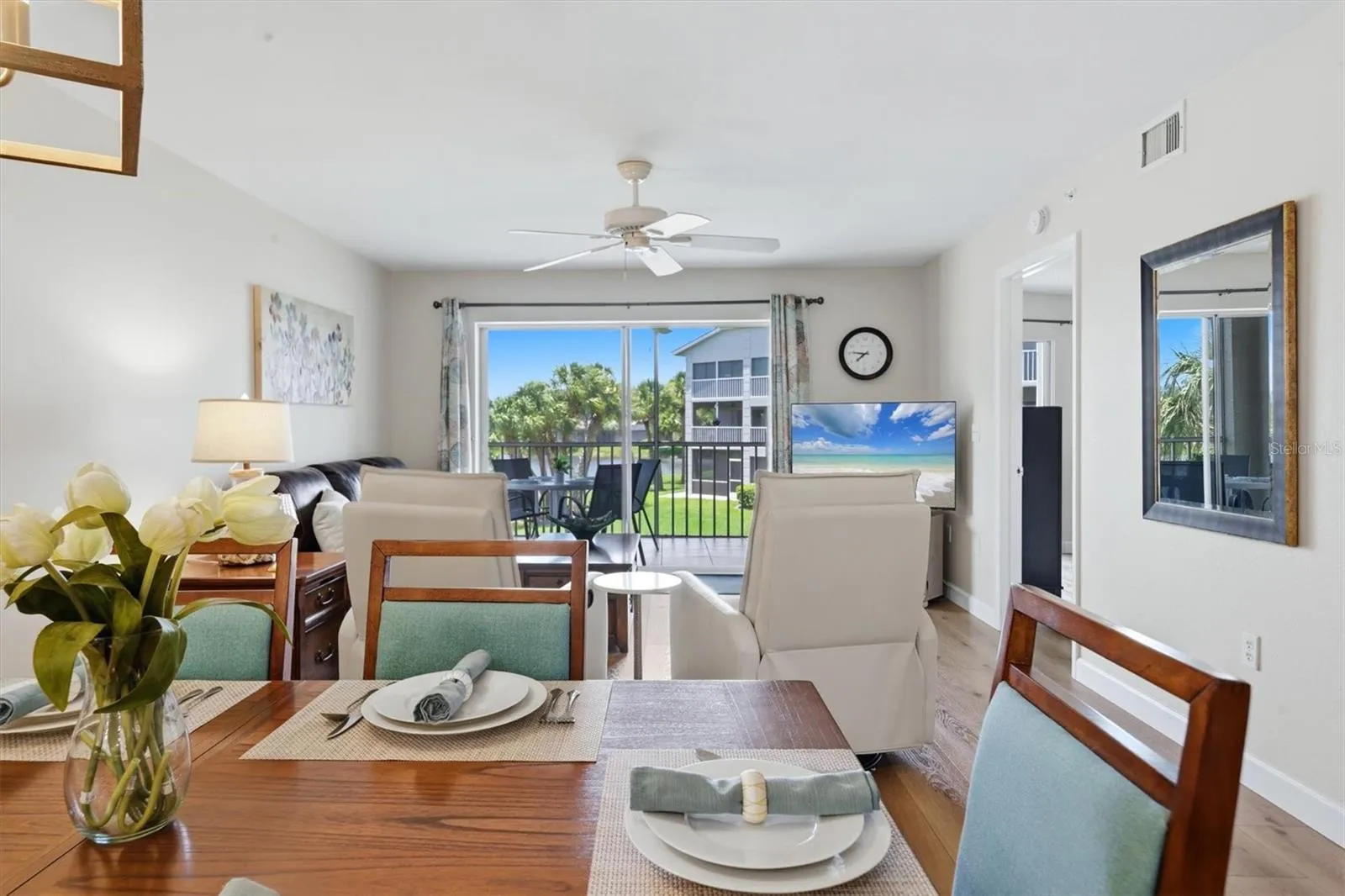 Dining/living room with lanai in the background