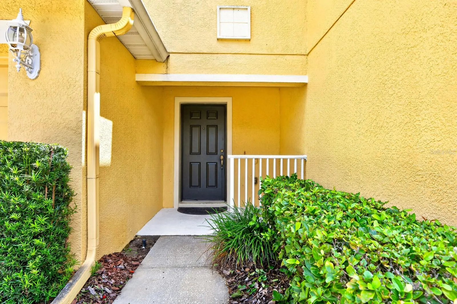 Covered front porch entry.