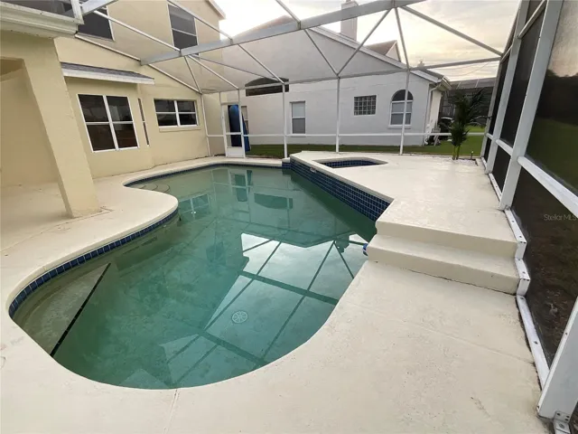 Pool and Hot Tub in Screened Pool Deck