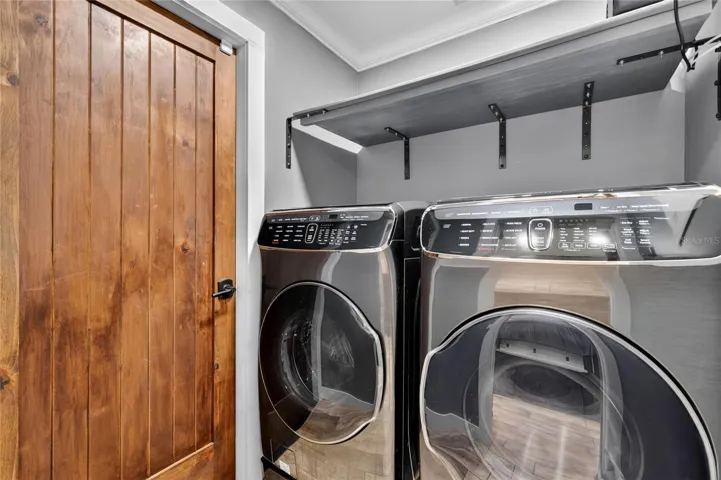 Interior laundry room with Samsun washer and dryer included ~