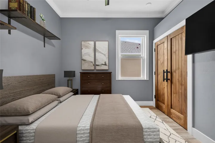 Virtually staged Bedroom 2 ~