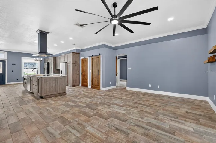 The kitchen flows into the family room ~