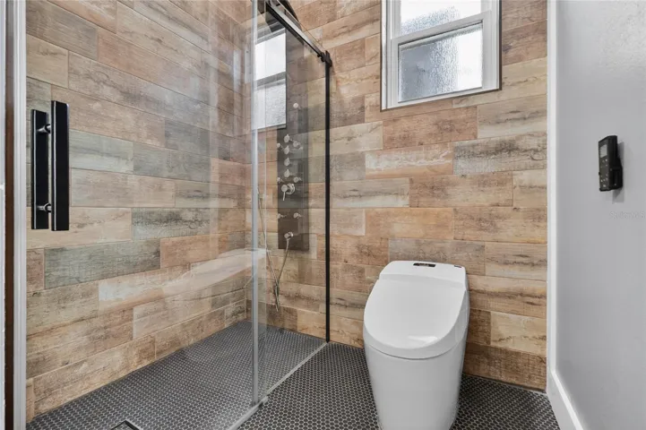 Upgraded shower, elongated automatic toilet/bidet ~
