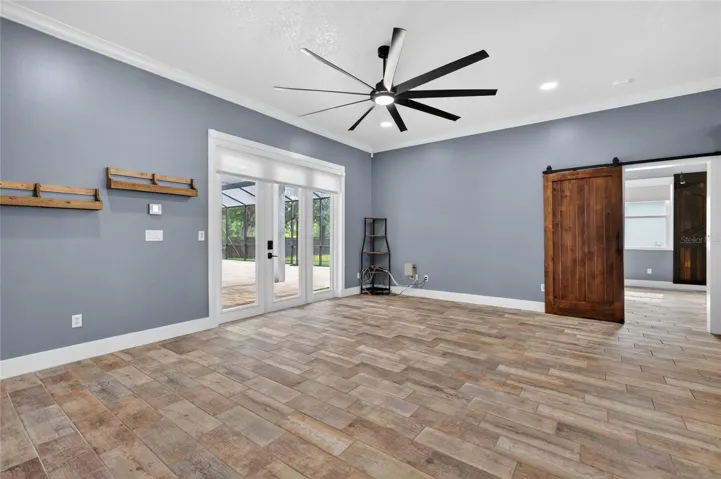 Easy care wood-look ceramic tile floors in living area and bedrooms ~