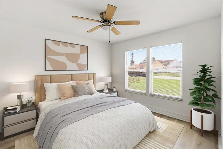 Secondary Bedroom Overlooking Spacious Yard-Virtually Staged