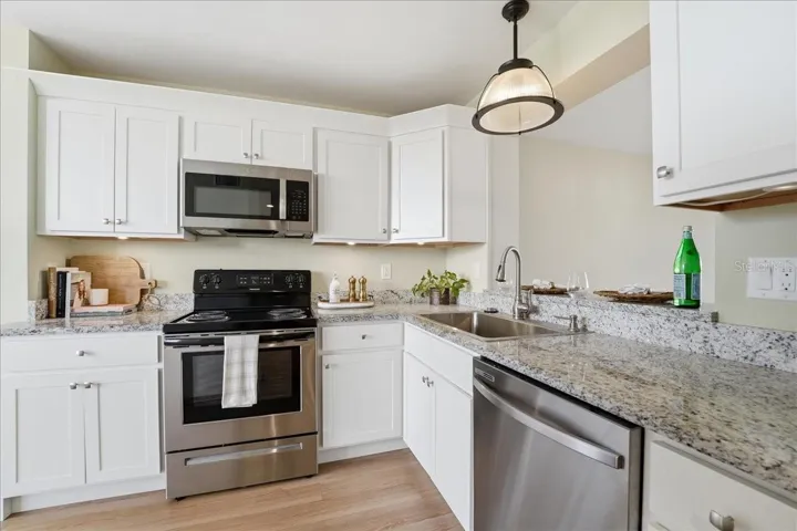 Updated kitchen with granite countertops