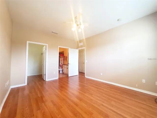 Downstairs ensuite bedroom/full bath with walk in closet