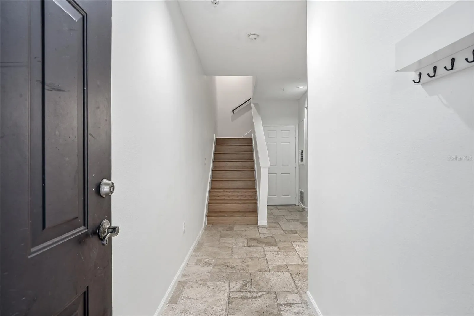 1st floor stairs lead to the 2nd floor to the living space