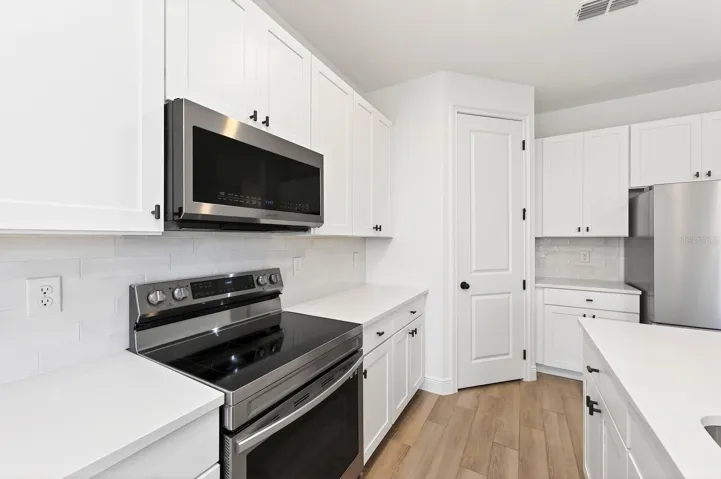 Upgraded stainless steel appliances.