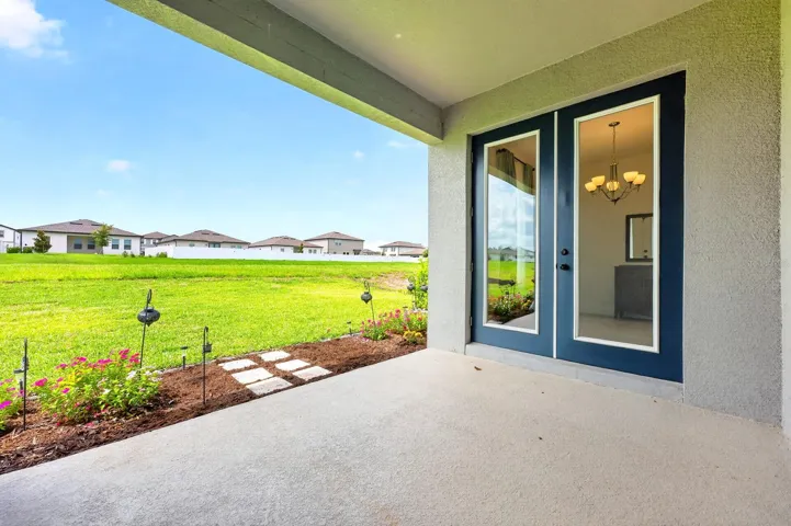 French doors open to the covered lanai.