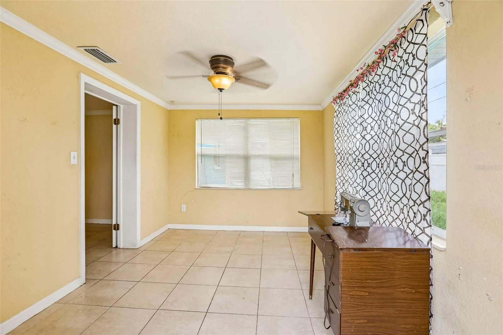 covered patio that can be used an an additional room
