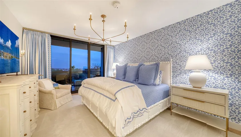 Impeccably styled and renovated just as the other primary with its own private terrace Enjoying Sarasota Bay from morning into the evenings