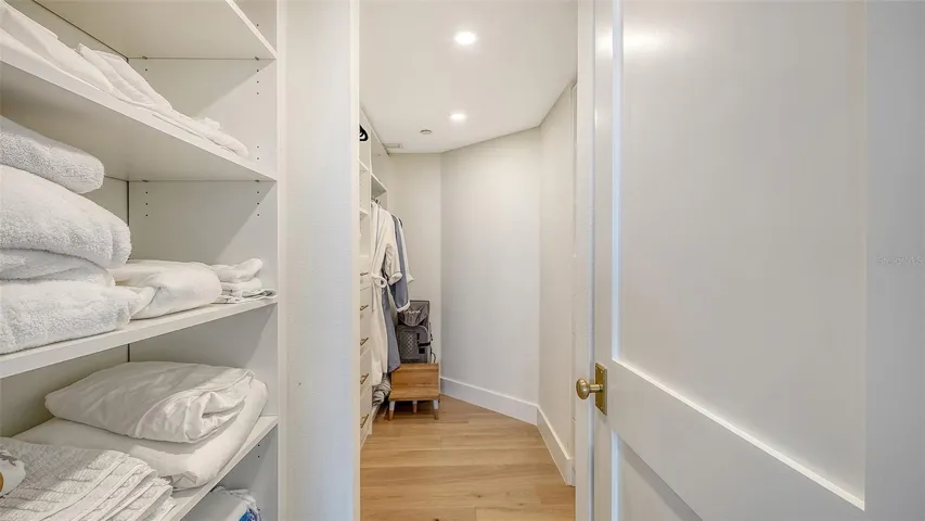 This large walk in closet in the guest esuite could be another bedroom It's so spacious !