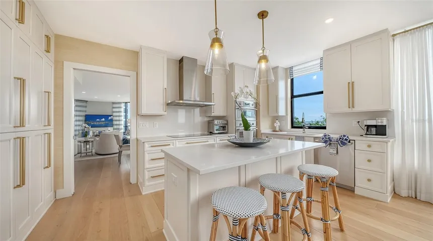 This custom renovation spared no expense with an 80 bottle top of the line wine  frig, Thermador Gourmet appliances throughout