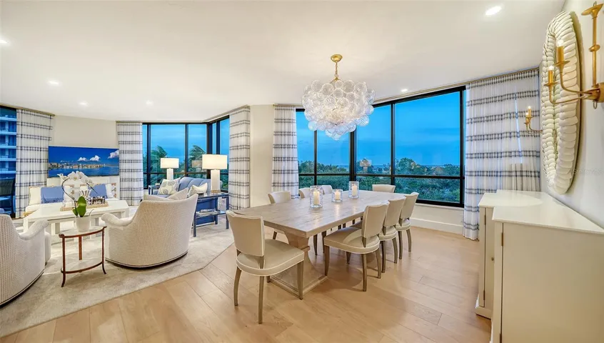 The gorgeous dining room has amazing vistas forever a wonderful entertaining space.