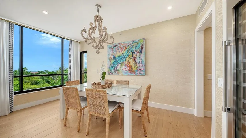 The eat-in  kitchen area is elegant but  functional to really  work as another area for entertaining w/ those big gatherings !