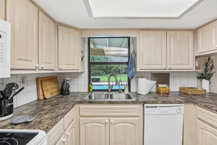 Kitchen View of Pool / Backyard