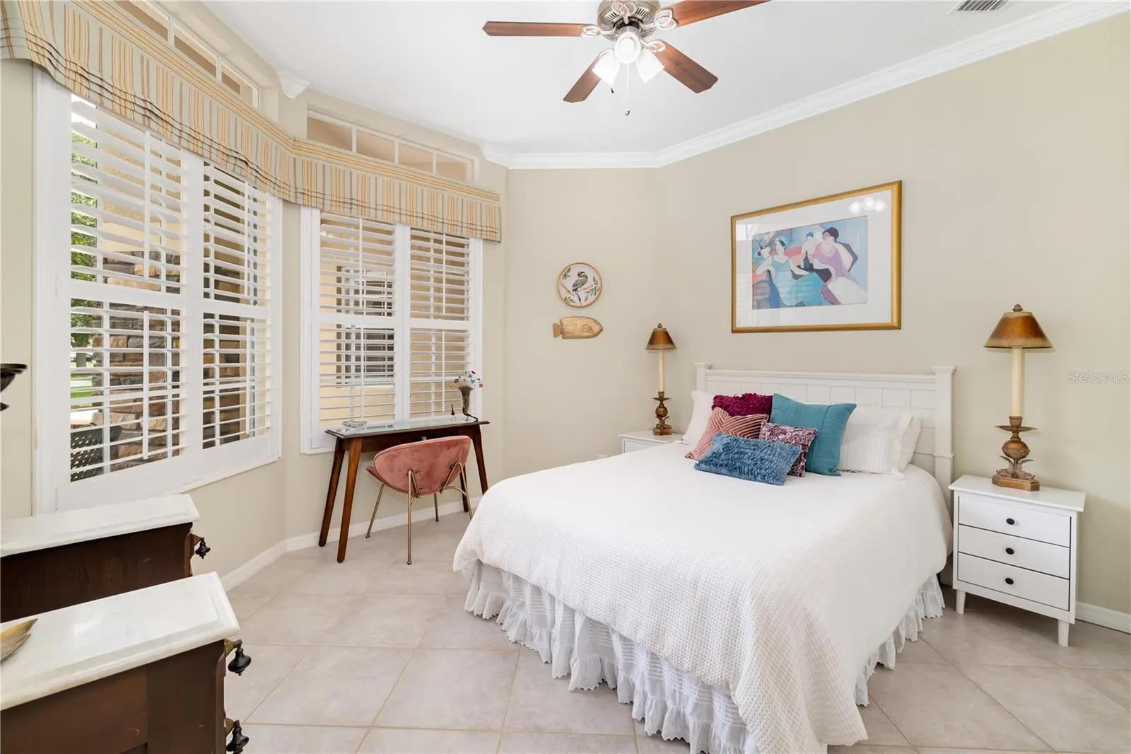 Bedroom suite 2 with closet, ceramic flooring, plantation shutters