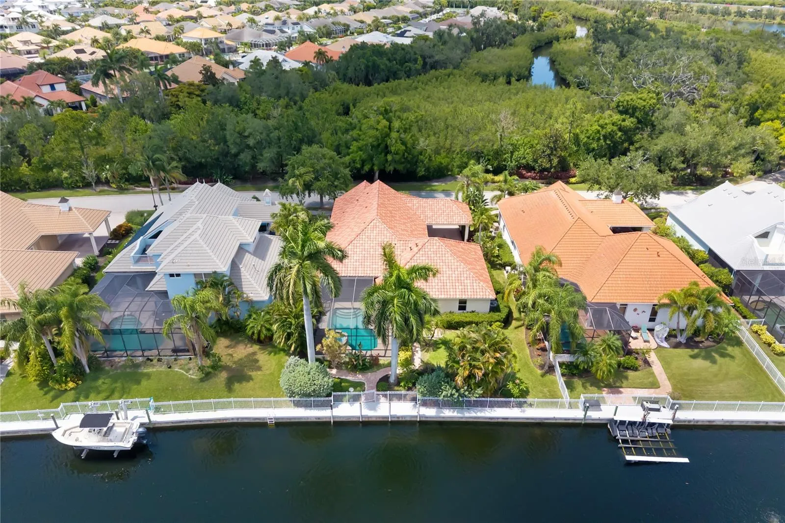 BRING YOUR BOAT, HARBOUR WALK WATERFRONT LIVING! PRIVATE DOCK, POOL, NEW ROOF, OFFICE/DEN, GATED COMMUNITY, NO CDD