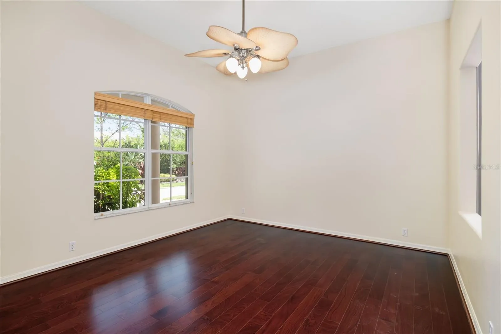 French doors leading to the Den/office with access to half bath.