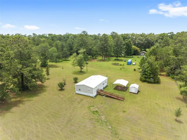 Welcome HOME to this lovely home on 5.36 acres!