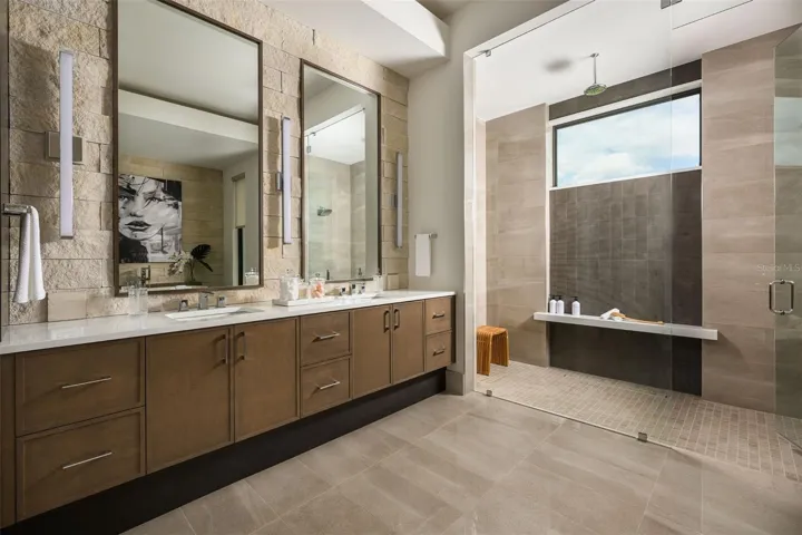Primary en suite (photo from Lago model)