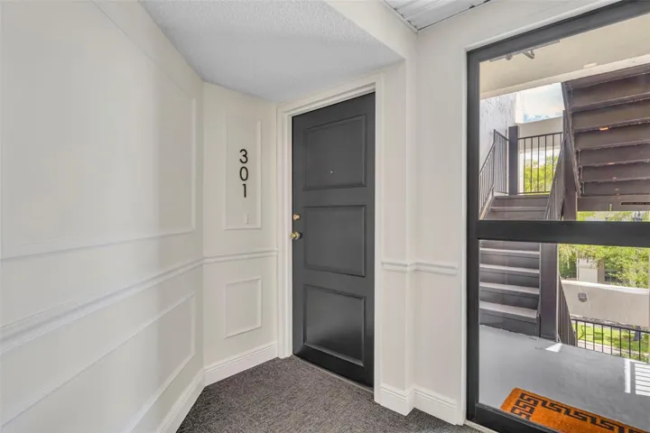 Front Door of #301 which is a corner unit