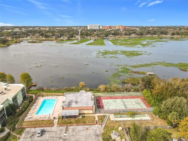 Aerial of pool and tennis courts