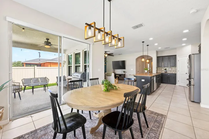 Light filled dining area opens to the covered lanai.
