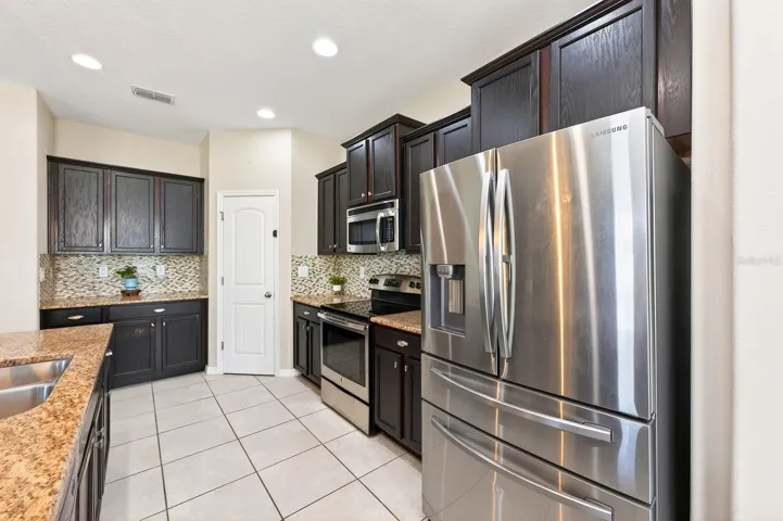 Stainless steel appliances and ample storage.