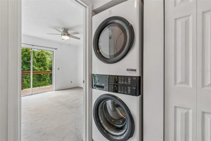 Landing/Laundry Closet/Entry to Primary Bedroom