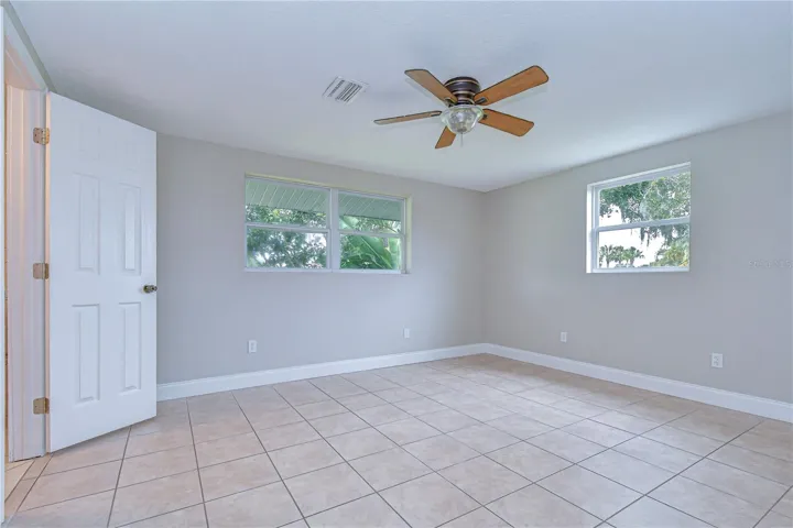 Spacious owner’s retreat with peaceful natural light.