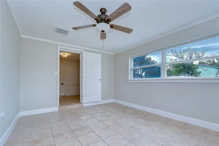 Flexible additional living space ideal for a media room, office, or fitness area.