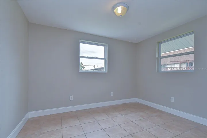 Comfortable guest or family bedroom with versatile use.