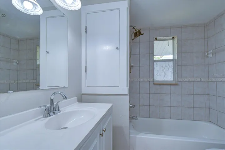 Beautifully renovated full bathroom with modern updates.